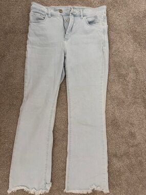 Light Wash Flare Jeans with Frayed Hem